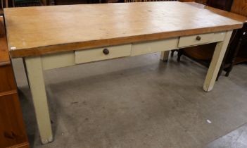 A Victorian style painted pine four drawer farmhouse kitchen table