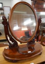 A Victorian mahogany oval bedroom table mirror and a late Victorian mahogany child's bedroom chair