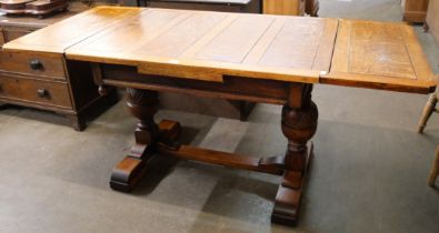 An oak draw-leaf table