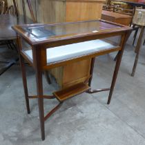 An Edward VII inlaid mahogany bijouterie table