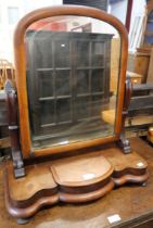 A mahogany toilet mirror