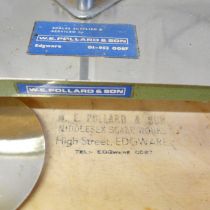 A set of measuring scales, W.E Pollard & Son and a collection of weights