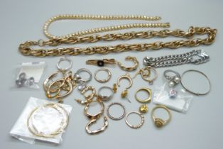 Two silver rings, other rings, two necklaces, earrings, etc.