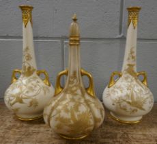 A pair of 19th Century Royal Worcester ivory ground bottle vases decorated with birds and foliage,