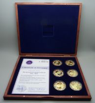 Two cased sets of six coins, Queen Elizabeth II Platinum Jubilee and six assorted commemoratives