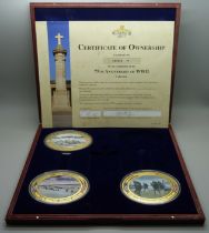 Seven Windsor Mint D-Day commemorative medallions, in two cases