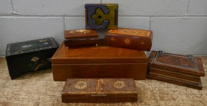 A collection of decorative boxes including carved and inlaid **PLEASE NOTE THIS LOT IS NOT
