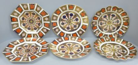 Six Royal Crown Derby 1128 pattern plates; two octagonal, two circular and two wavy edge, one