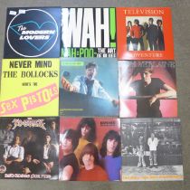 A collection of 24 punk and new wave LP records