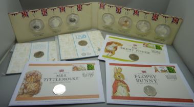 A collection of 50p coins, VE Day, Beatrix Potter including four coin covers and three Royal Mint,