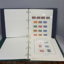 Two albums of stamps, The King George VI 1946 Victory Stamp Collection and 1937 Coronation Omnibus