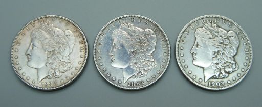 Three silver US one dollar coins, 1882, 1888 and 1902, 80.2g