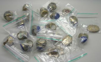 Sixteen large lapis set rings and four pendants