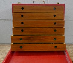 A six drawer wooden cabinet; one drawer of metal detector finds including medieval lead, horse