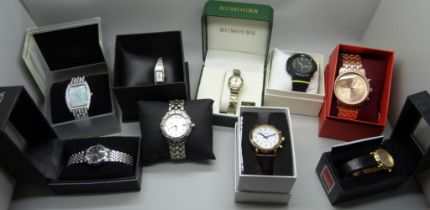 A collection of fashion wristwatches including Ben Sherman, Pierre Cardin, Sekonda, Vogue, etc.,