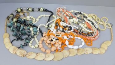 Twelve costume necklaces