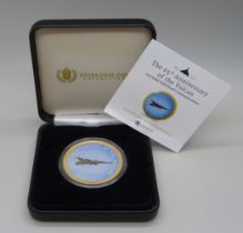 A 1oz solid gold proof commemorative coin, The 65th Anniversary of the Vulcan, 31.10g of 9ct gold,