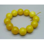 A Bakelite bead bracelet in yellow