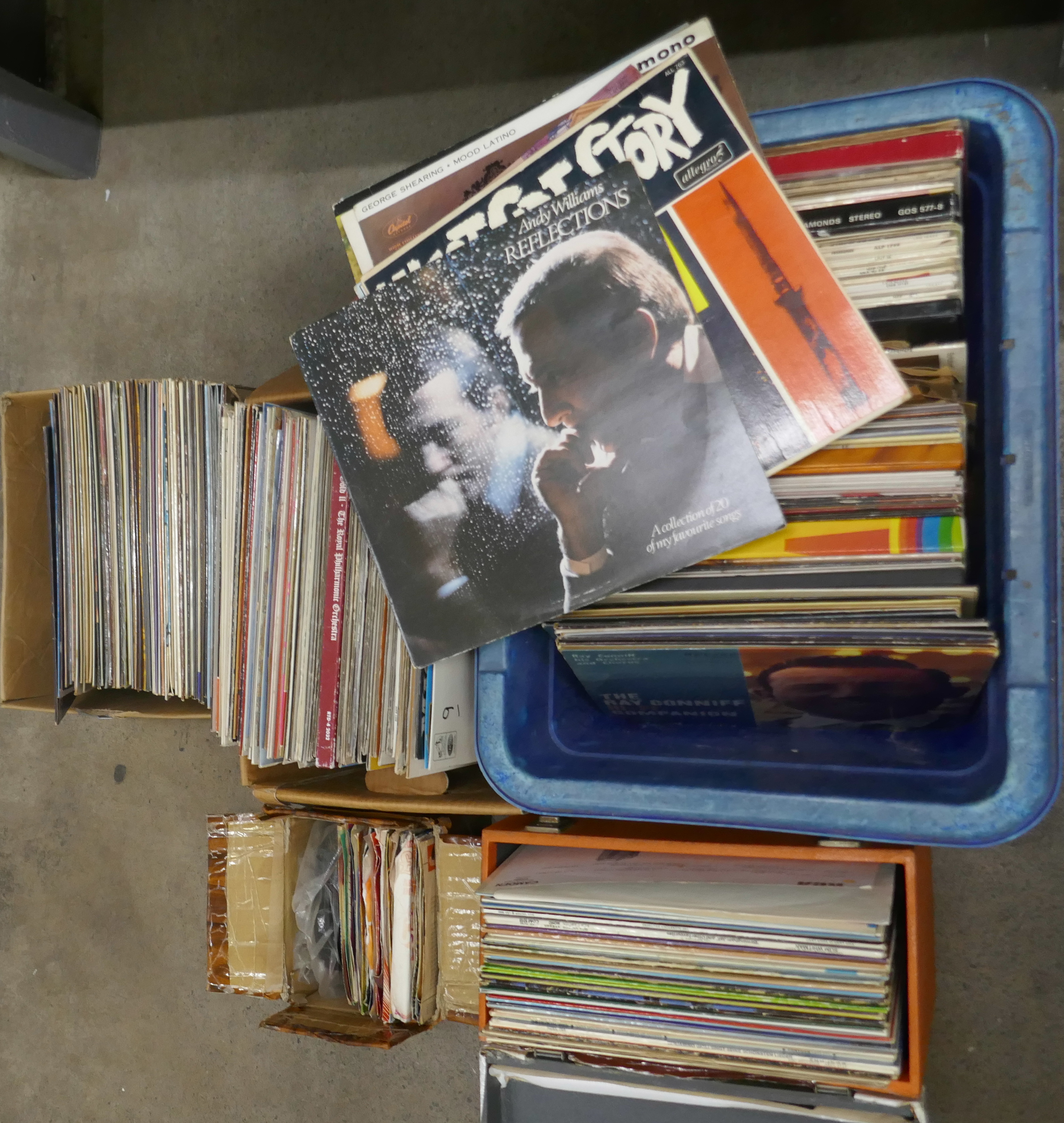 A large collection of LPs and 45 rpm vinyl records, some classical, mainly 1950s and 1970s