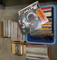 A large collection of LPs and 45 rpm vinyl records, some classical, mainly 1950s and 1970s