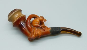 A carved pipe with horse detail, cased, mouthpiece/stem a/f