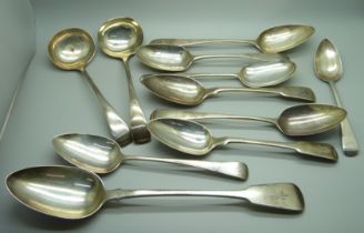 Nine 19th Century silver serving spoons and a pair of later silver ladles by Mappin & Webb, 760g