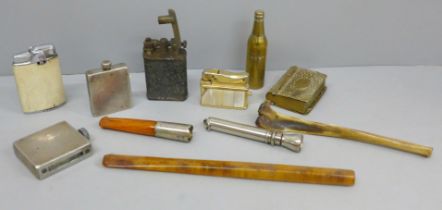 A hallmarked silver cased tinder box, another tinder box, various smoking related items including