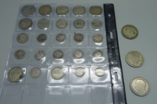 A collection coins including silver, some drilled