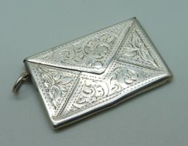 An engraved silver stamp case, Birmingham 1909, 41mm wide