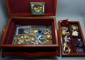 A collection of brooches including an Art Deco style fox brooch and many signed