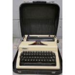 An Erika portable typewriter **PLEASE NOTE THIS LOT IS NOT ELIGIBLE FOR POSTING AND PACKING**