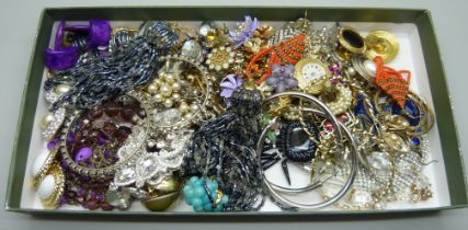 A collection of costume earrings, etc.