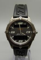 A gentleman's Breitling Aerospace analogue and digital time wristwatch, E65062-18039, with box and
