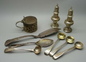 A silver mustard, four silver mustard spoons, two silver servers and a pair of silver peppers, 353g