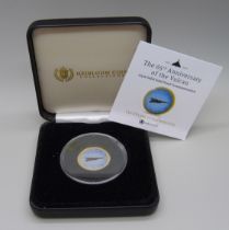 A ¼oz. solid gold proof commemorative coin, the 65th Anniversary of the Vulcan, 7.78g of 9ct gold,