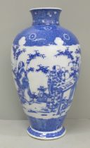 A Chinese blue and whtie porcelain vase with marks to base, 24cm