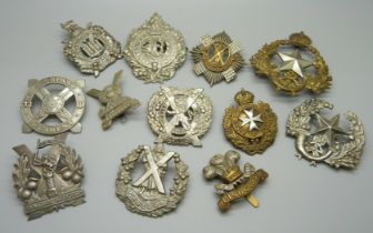 Twelve vintage military cap and other badges, including Scottish regiments