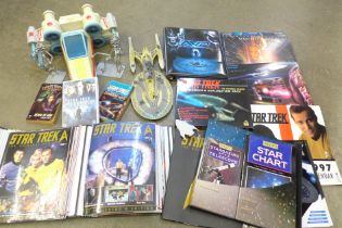 A collection of Star Trek models, an exploration pack, three laser discs, etc.