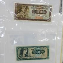 An album of foreign bank notes, Kenyan, Romanian, etc.