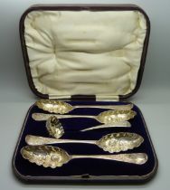 Four George II silver berry spoons and a later silver sugar sprinkler, 1742-