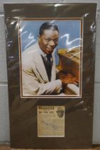 A Nat King Cole autographed display