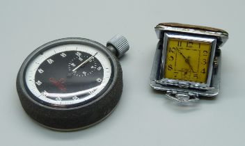 An Omega stopwatch and a Swiss made travel clock