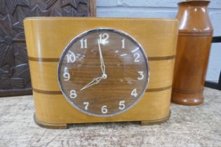 A coin clock, a wooden flask with handle and a carved panel **PLEASE NOTE THIS LOT IS NOT ELIGIBLE