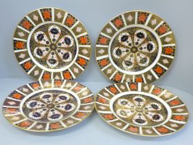 Four Royal Crown Derby 1128 pattern 27cm dinner plates, three second quality