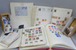 A collection of stamps including Stanley Gibbons album with British stamps, two boxes of British and