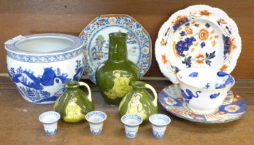 A collection of oriental pottery including jardinere, plates, vase and a matching pair of jugs **