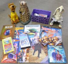 A collection of Dr. Who and Thunderbirds items including books, a model Dalek and a Scooby Doo