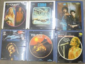 Six laser discs; Carrie, Coma, Dexy's Midnight Runners, Sheena Easton, Pink Floyd and Rod Stewart