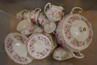 A Carlton ware Sunflower six setting coffee set and Royal Adderley Devonshire Roses tea set with