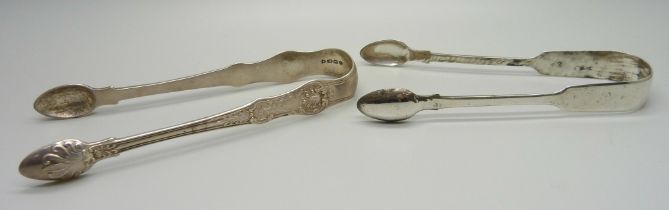 A pair of silver Queens pattern sugar bows, G. Adams, London 1857 and a pair of William IV silver